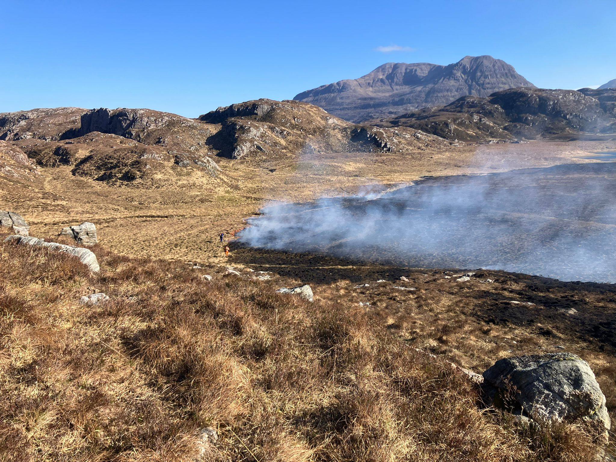 The Scottish Fire and Rescue Service said the wildfire in Assynt had a front four-to-five miles long.