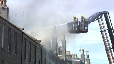 Two people in hospital as fire engulfs terrace house