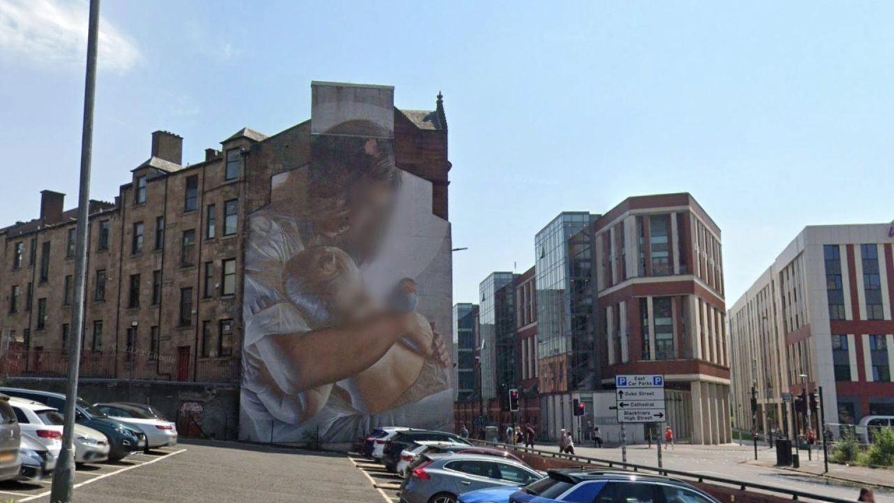 The previous mural featured St Enoch feeding the infant St Mungo