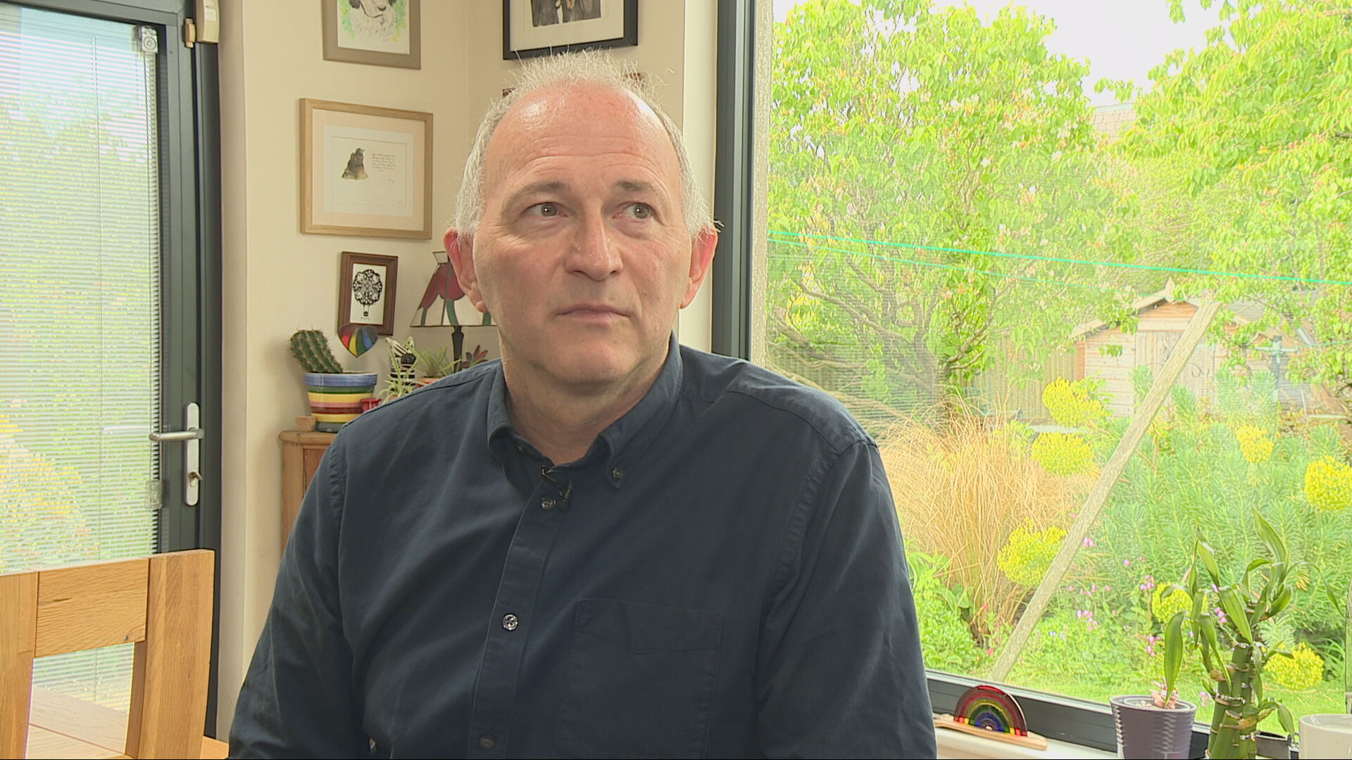 Graphic designer and co-director Derek Watson