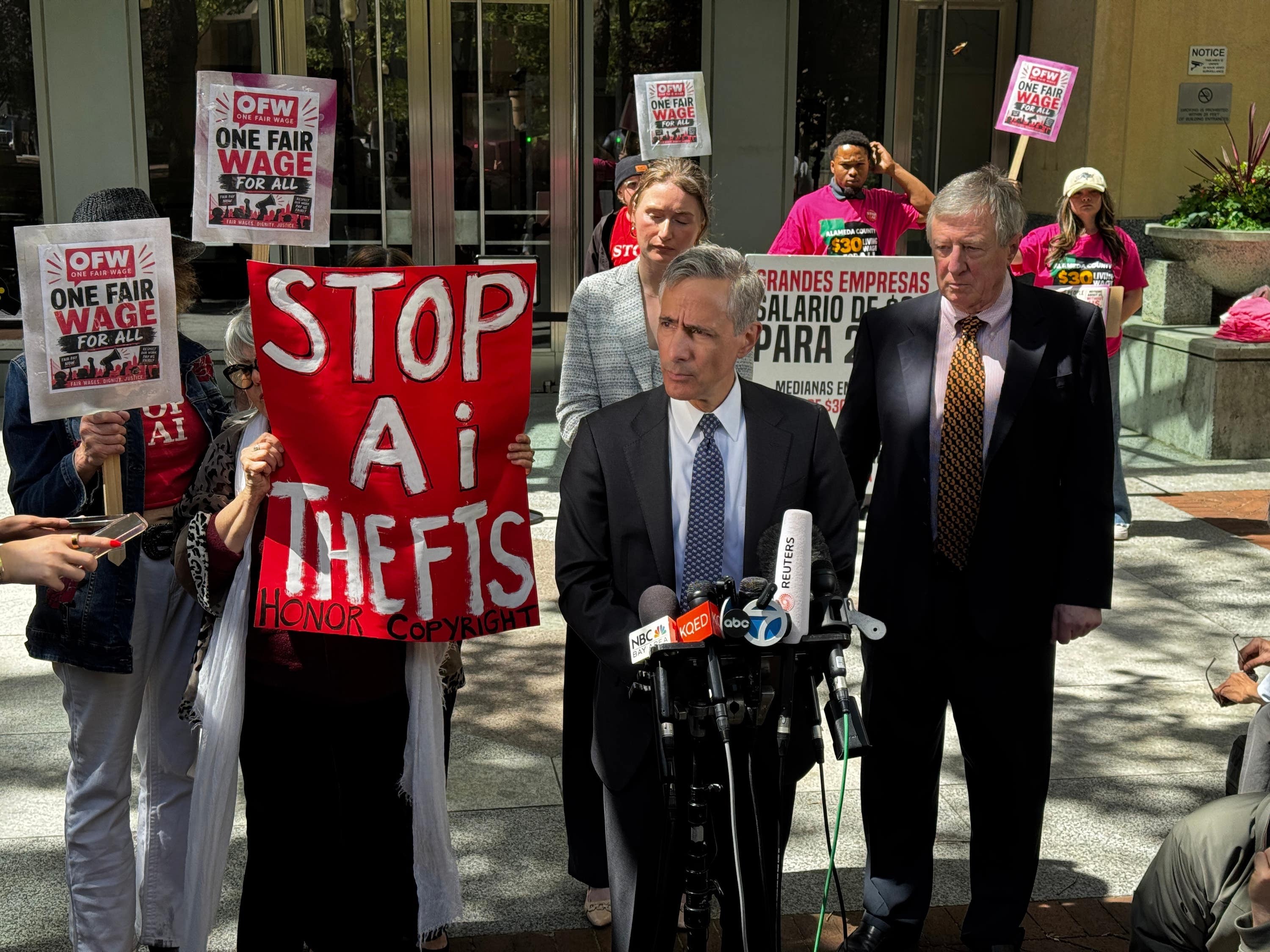 Bill Savitt, a lawyer for OpenAI, speaks to the media after the ruling