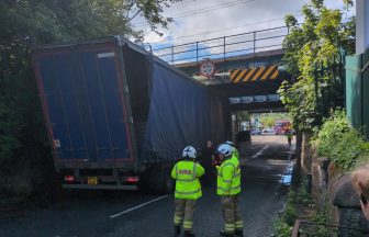 Trains between Glasgow and Edinburgh disrupted after lorry strikes bridge