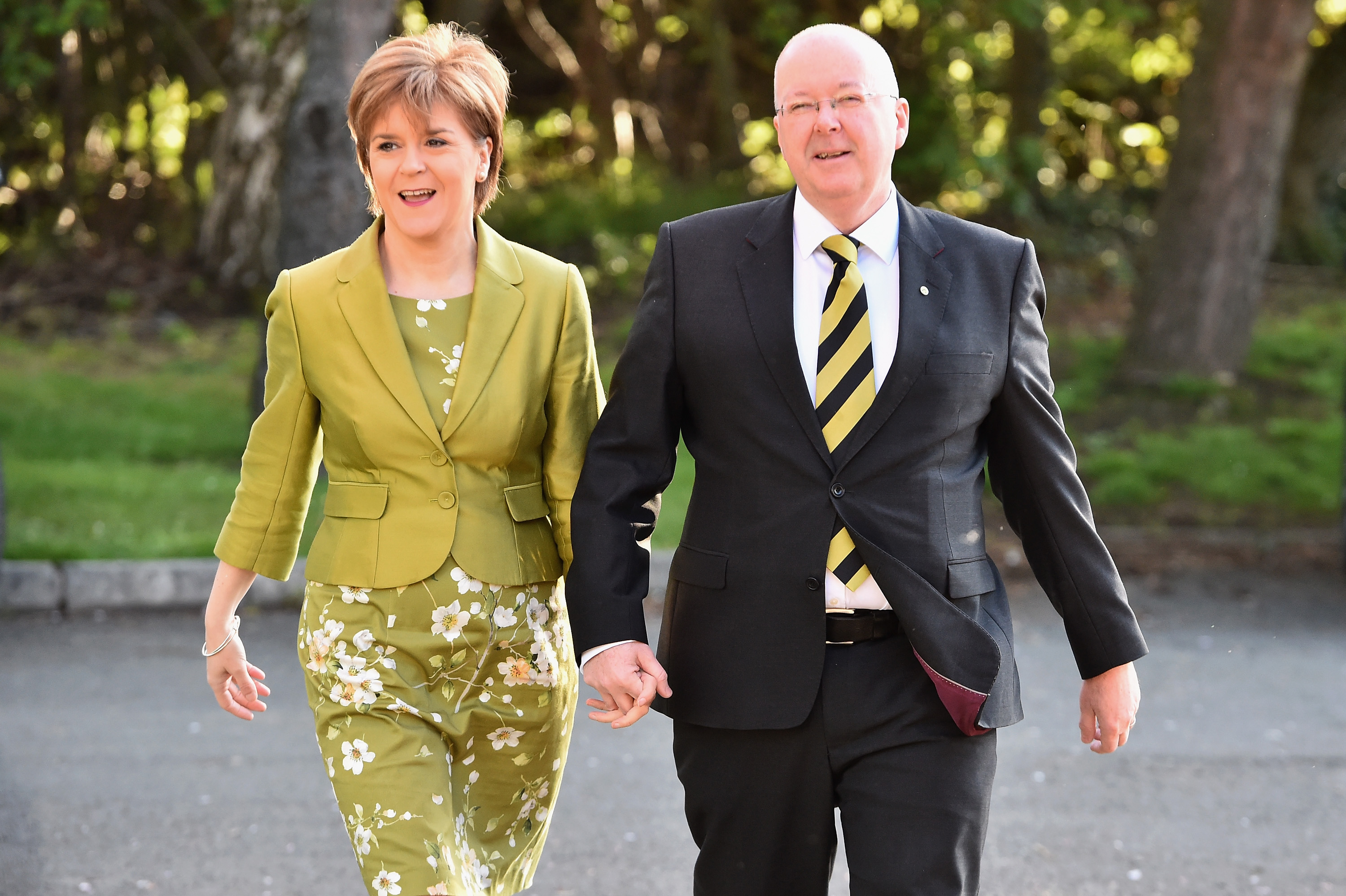 Former First Minister of Scotland and leader of the SNP Nicola Sturgeon with her husband Peter Murrell on May 7, 2015.