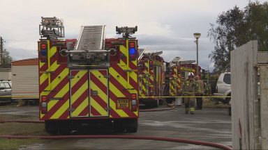 Fire crews battle well-established static caravan blaze at Jubilee Caravan Park in Glasgow