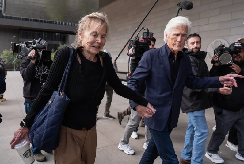 Matthew Perry’s mother, Suzanne Morrison, left, and Keith Morrison, arrive at federal court for the sentencing of Kenneth Iwamasa
