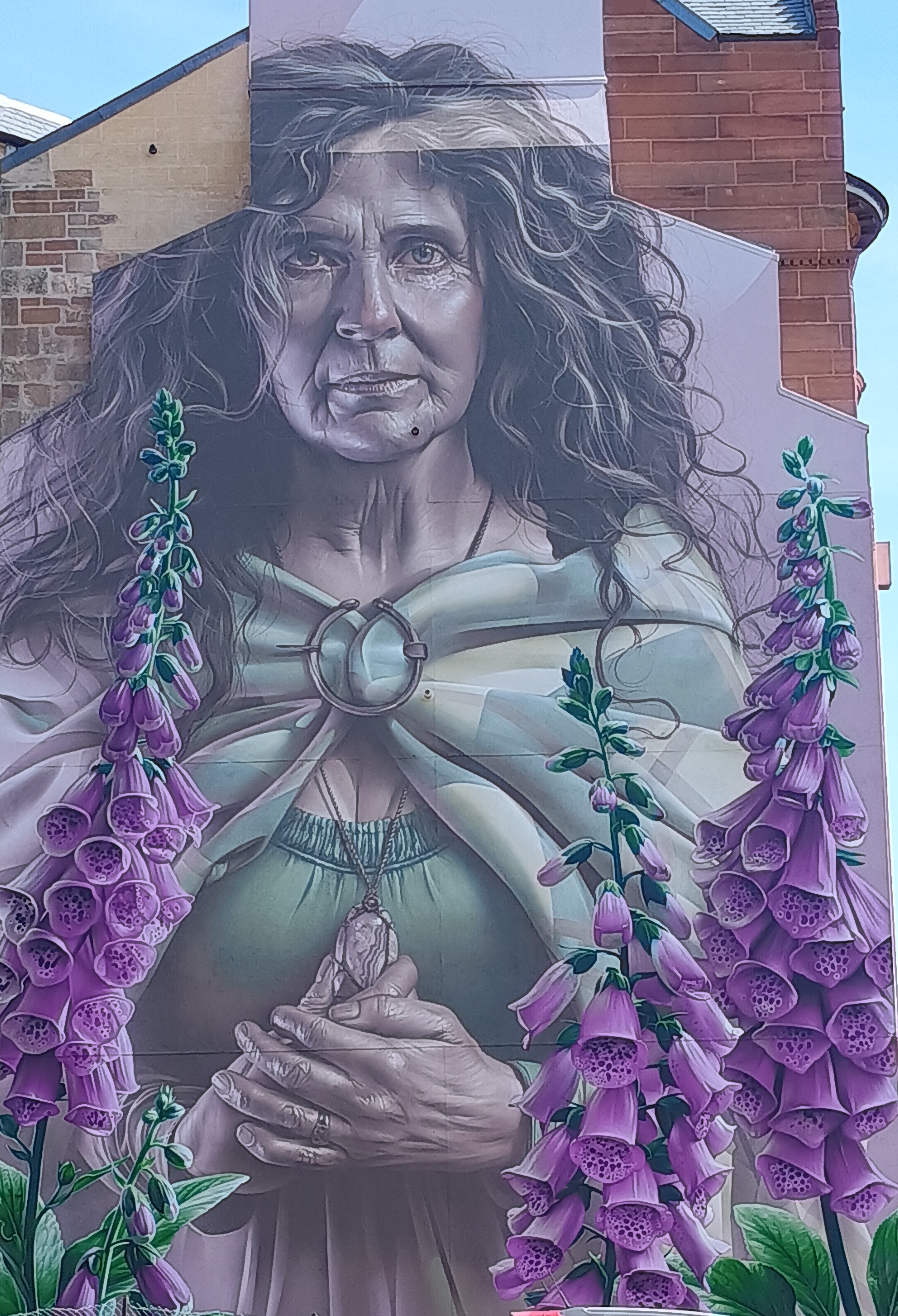 The new mural of St Enoch depicts her in later life