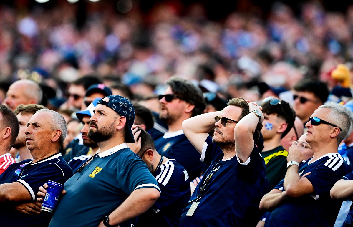 Fans watch the game