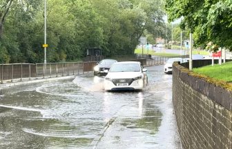 Heavy rain causes flooding and travel disruption in Aberdeen, Dundee and Fife