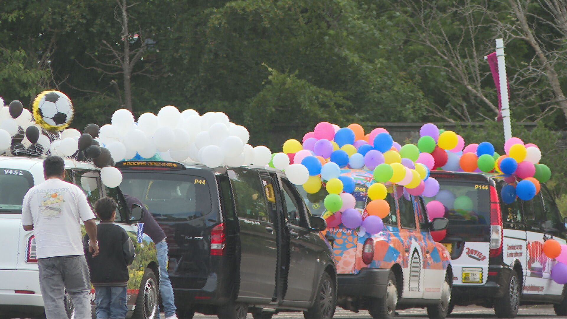 Taxis were decorated with colourful balloons