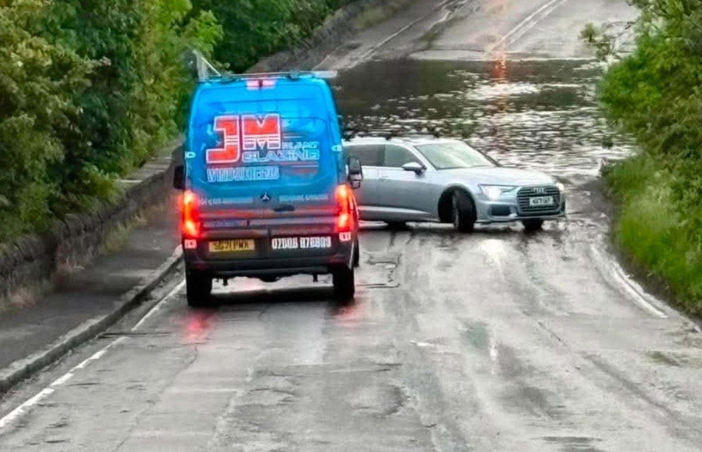 A road in Crossford has been flooded