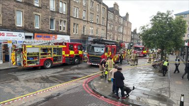 Firefighters extinguish blaze at shop