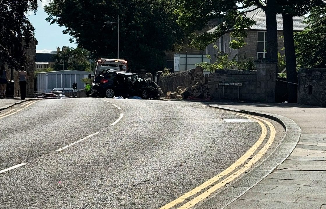 Three men in hospital after car crashes into wall in St Andrews