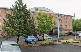 Woman charged with hate crime following protest at Greenock hotel after Belfast stabbing