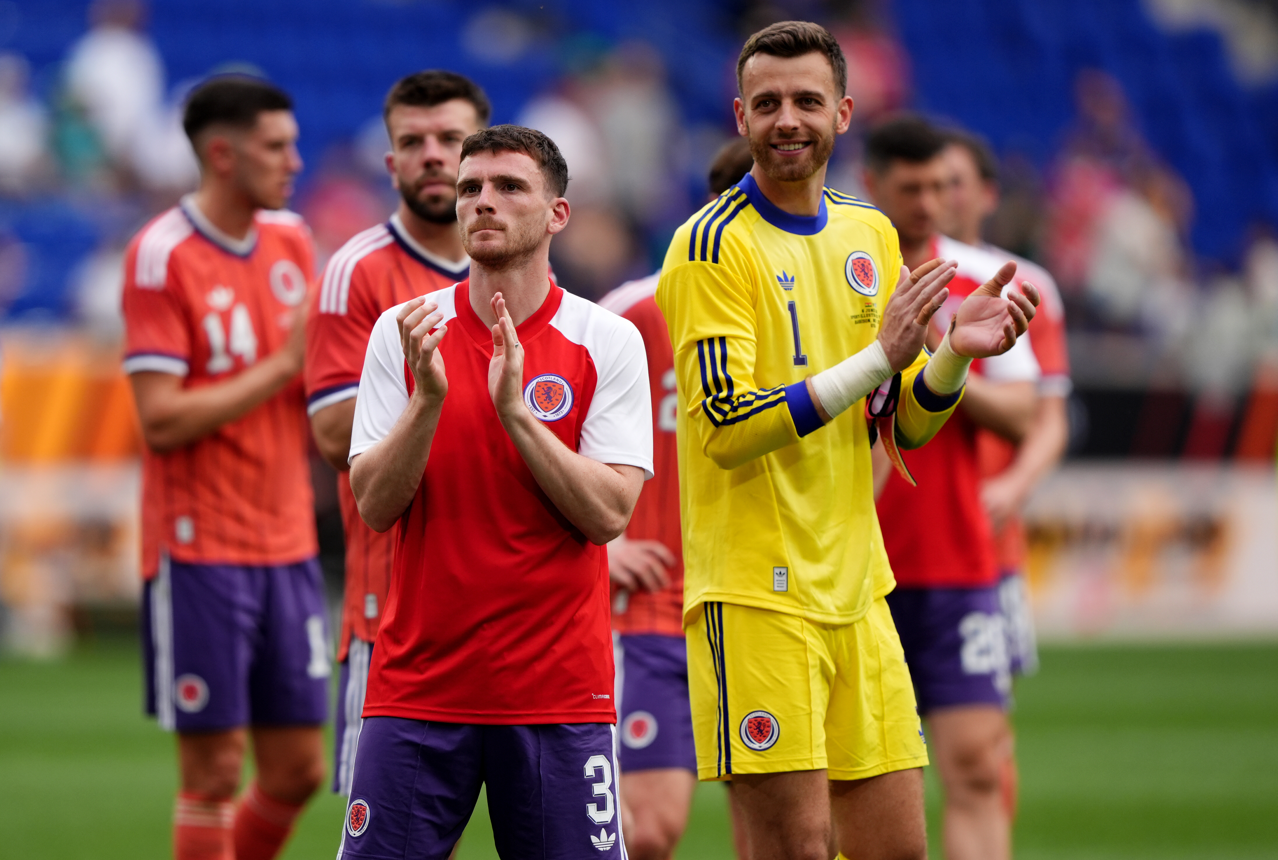 Scotland's Andy Robertson (left) and goalkeeper Angus Gunn applaud the fans after the international friendly match at the Sports Illustrated Stadium in Harrison, New Jersey. Picture date: Saturday June 6, 2026.