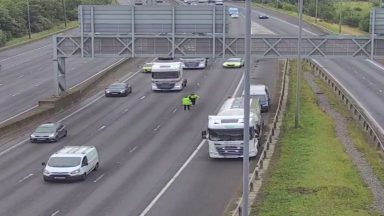 Lorry needing tyre changed closes lane on busy M74