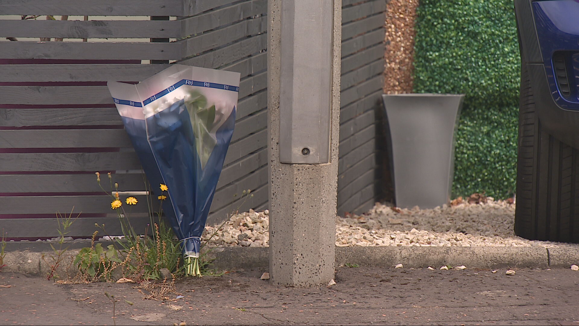 Flowers left at the scene of the incident on Craigievar Square, Edinburgh