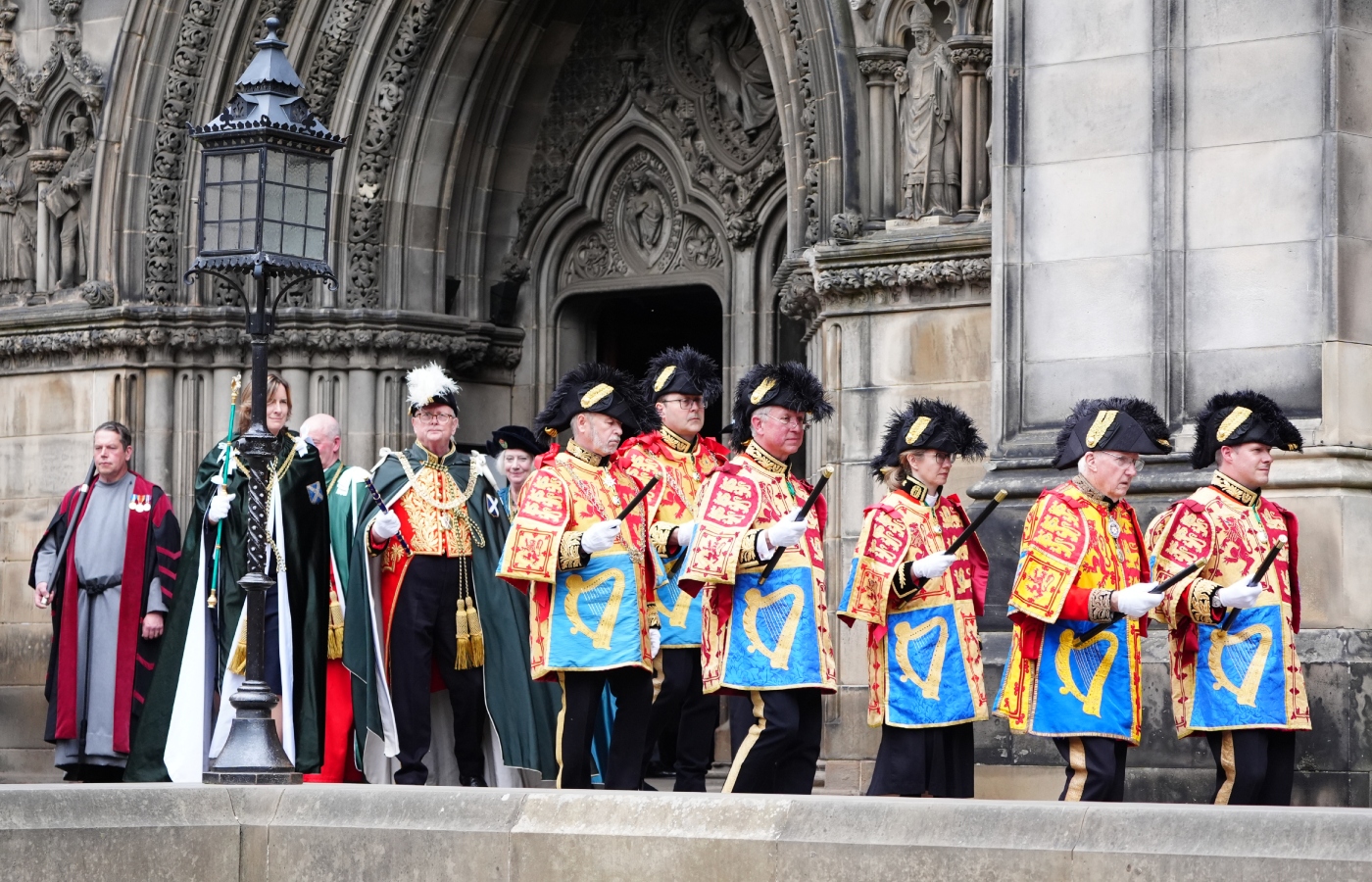 Heralds and Pursuivants followed by The Lord Lyon King of Arms Dr Joe Morrow, and Usher of the Green Rod Dame Katherine Grainger, were part of the spectacular service (Jane Barlow/PA)
