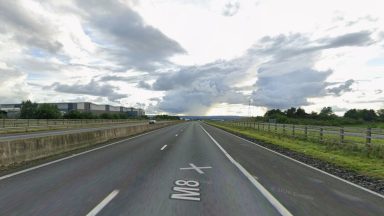 Three children among six hospitalised after serious crash between mini van and lorry on M8