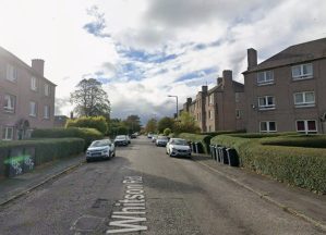 Two charged after man found unresponsive in garden fighting for life in hospital