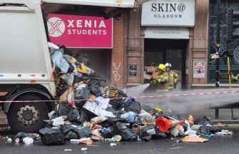 Bin lorry dumps rubbish on street after battery catches fire among waste