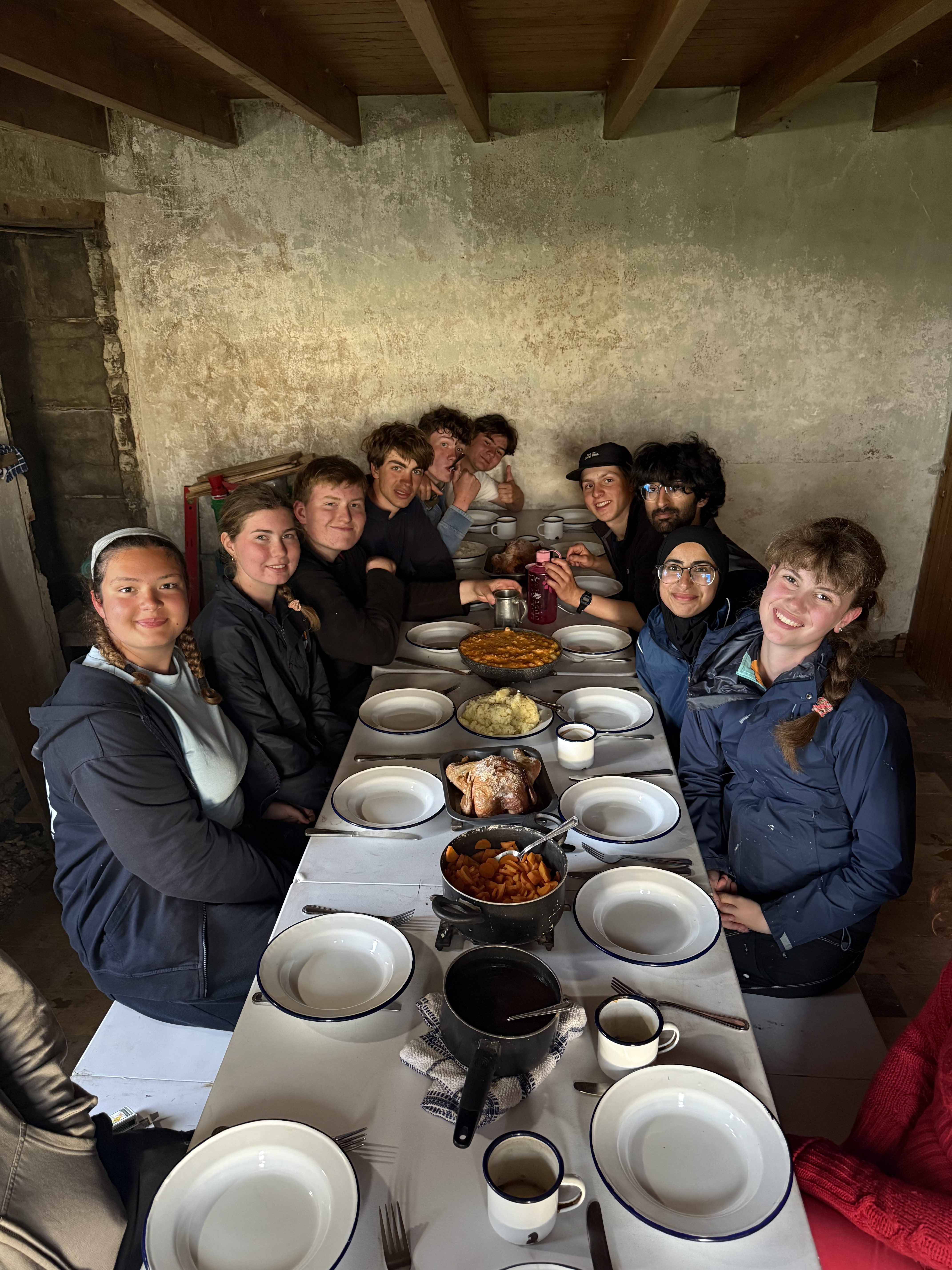 Group of students who discovered what is thought to be a medieval Viking church about 1,000 years old on an uninhabited Scottish island