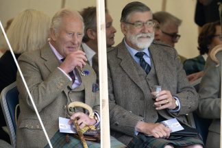 King Charles enjoys a dram of whisky as he attends Mey Highland Games