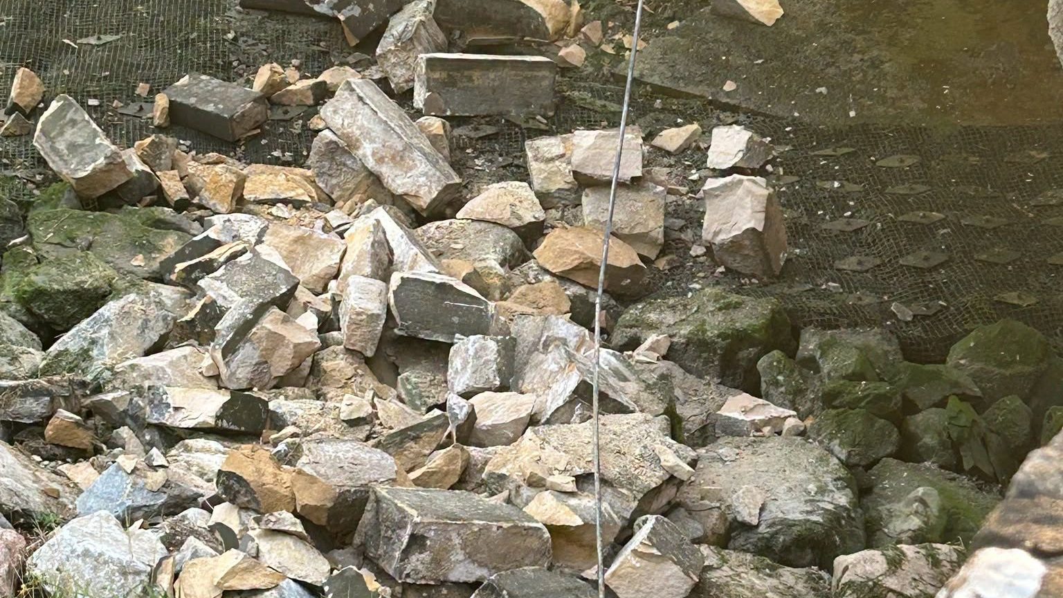 A large portion of the wall fell into the river valley.