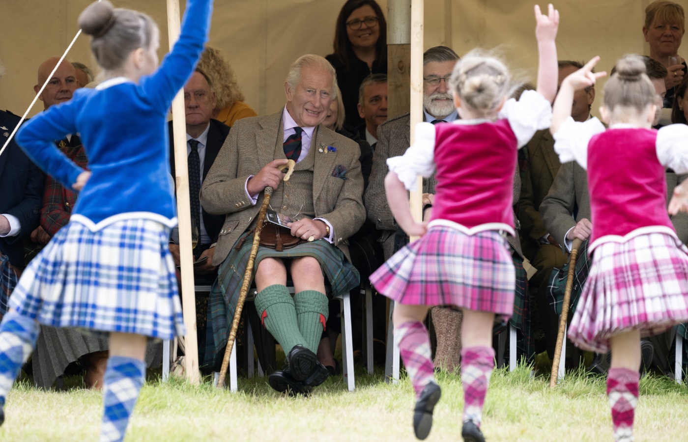 Charles watches dancers at the Mey Highland Games (Lesley Martin/PA)