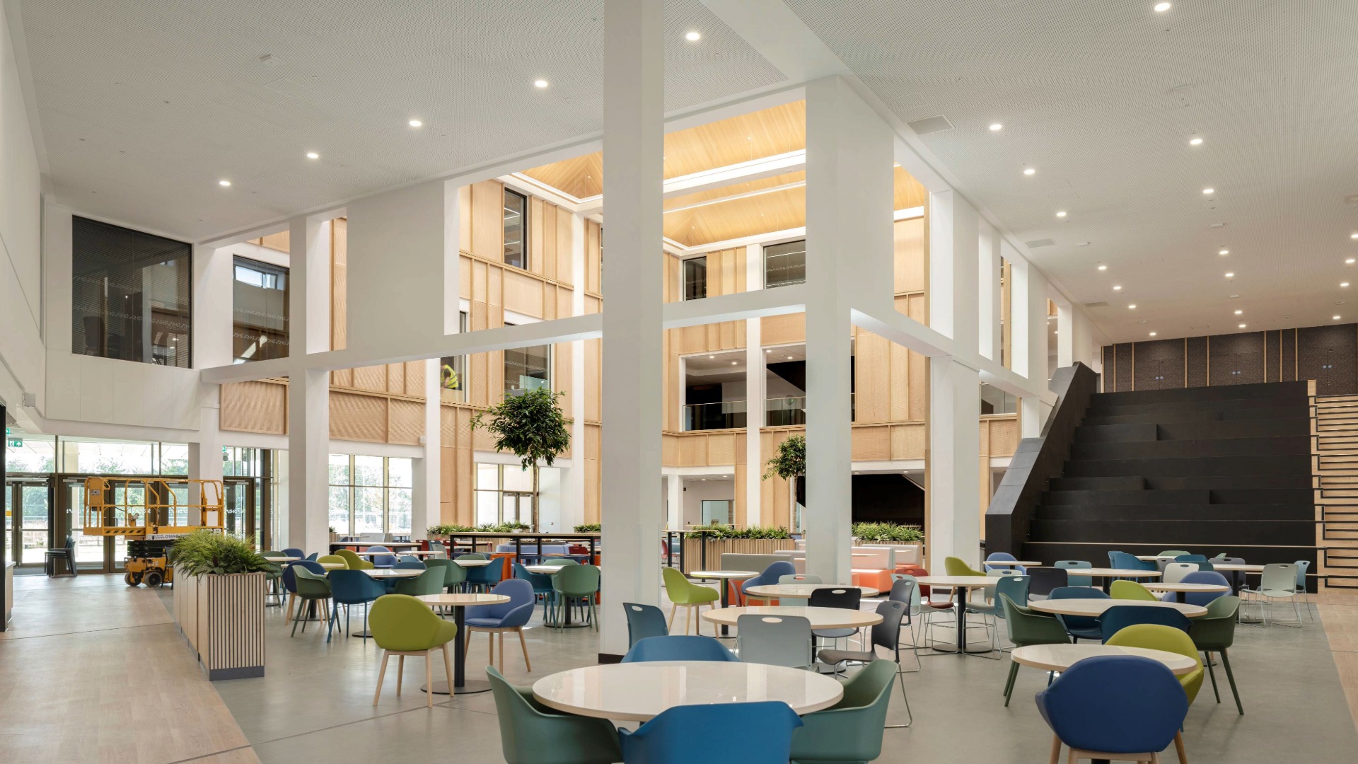 Views capturing the dining space and social stairs.