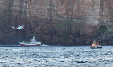 Fishing boat runs aground off Hoy as 17 people airlifted to safety